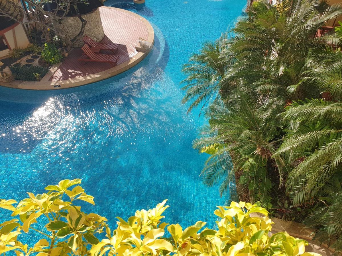 Patong Paragon Resort & Spa Sha Extra Plus Bagian luar foto The pool at the hotel